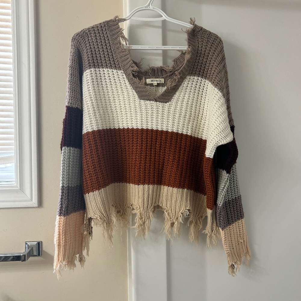 Frayed sweater